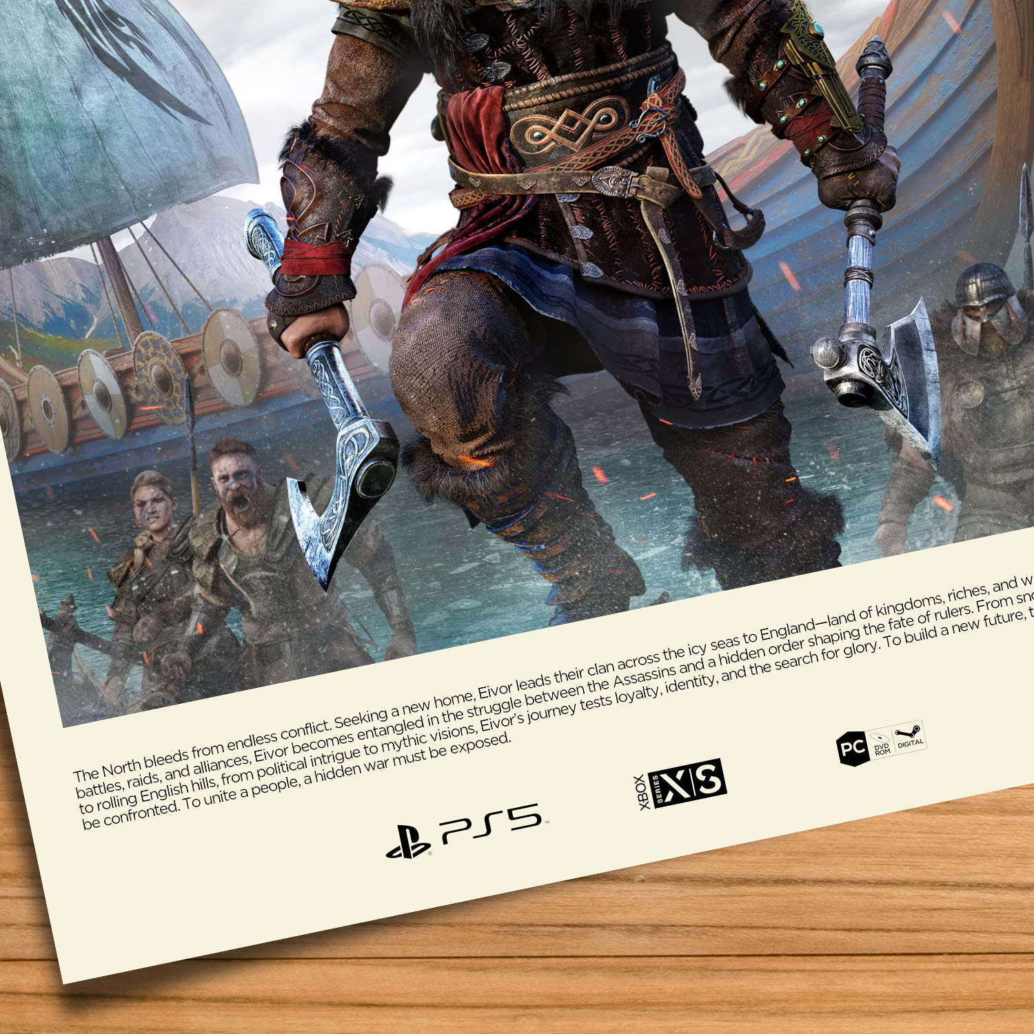 Gallery-style Assassin's Creed Valhalla poster on a wood table background