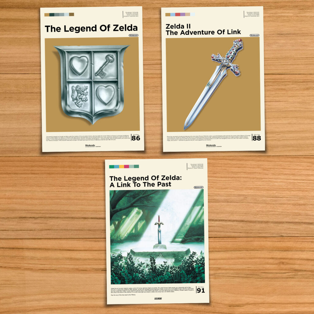 Legend of Zelda poster bundle, including Legend of Zelda, Zelda II Adventure of Link, and A Link to the Past on a wood table background