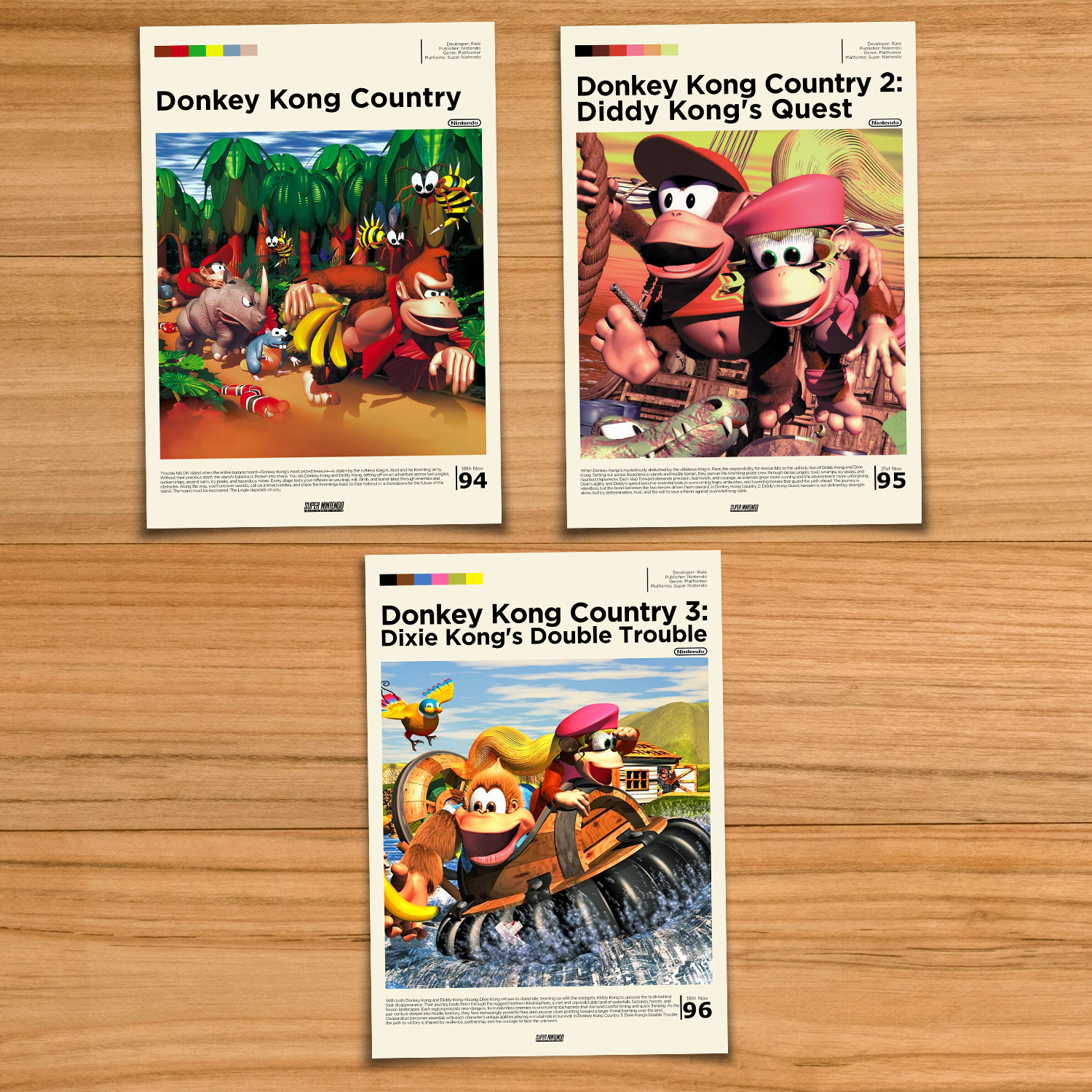 Donkey Kong Country poster set, including Donkey Kong Country, Donkey Kong Country 2 and Donkey Kong Country 3 on a wood table background