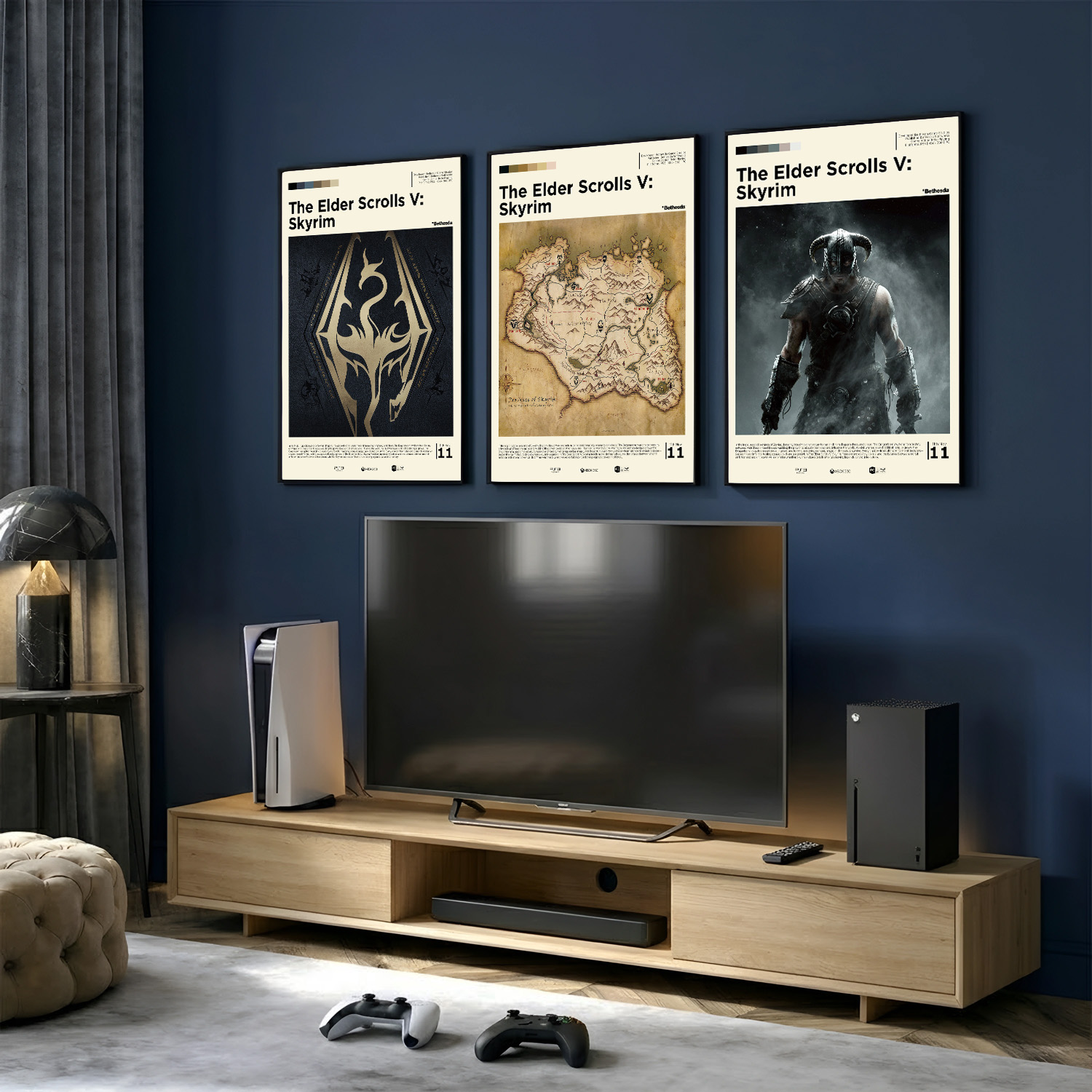 3 Elder Scrolls Skyrim posters in black frames on a blue wall with a TV and game consoles underneath