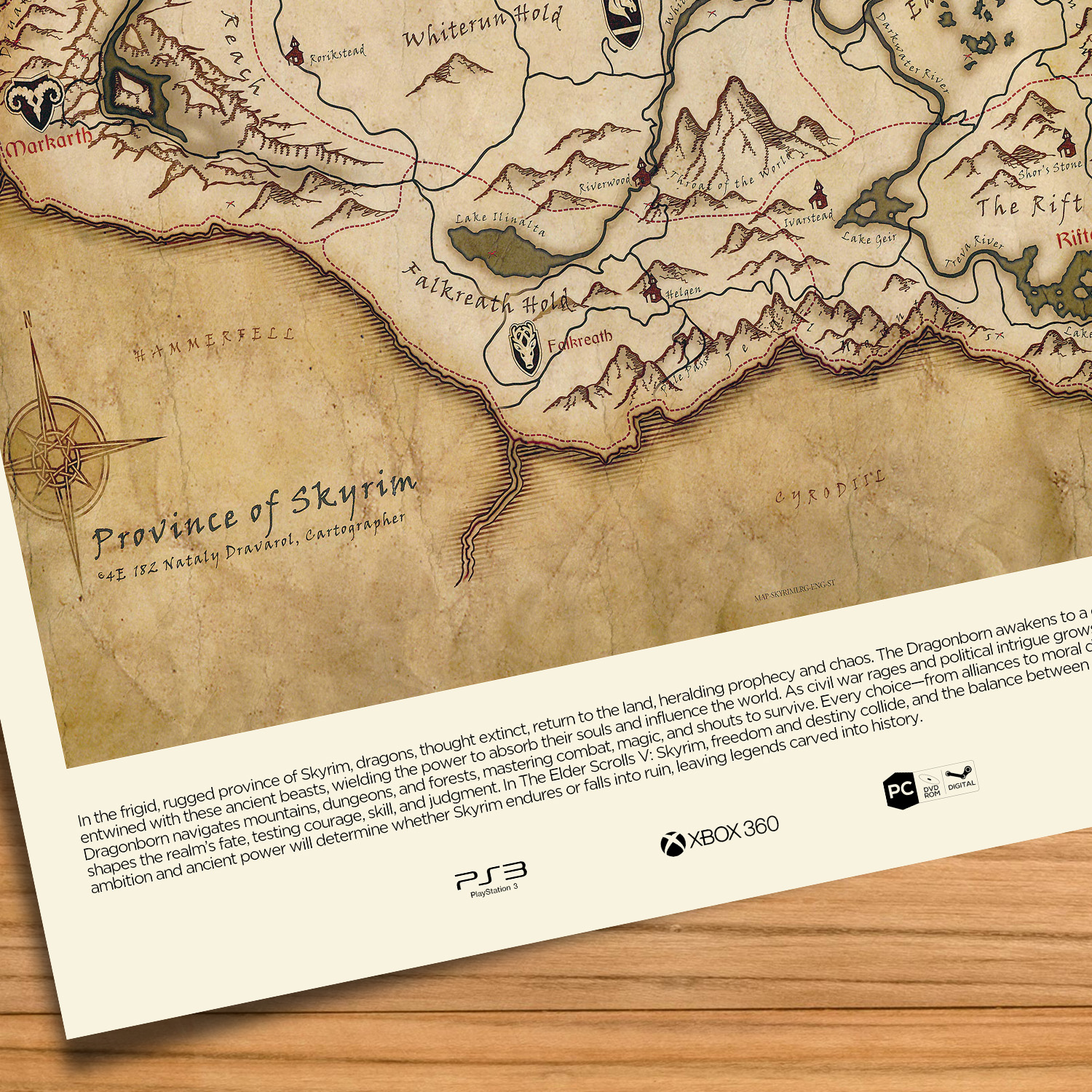 Minimalist, gallery-style Elder Scrolls Skyrim map poster on a wood table background