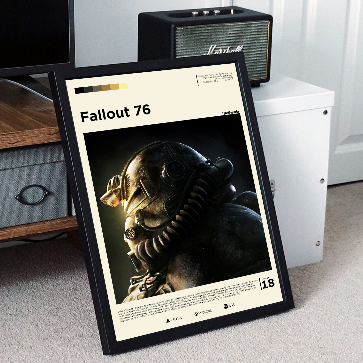 Minimalist, gallery-style Fallout 76 poster in a black frame leaning against a unit