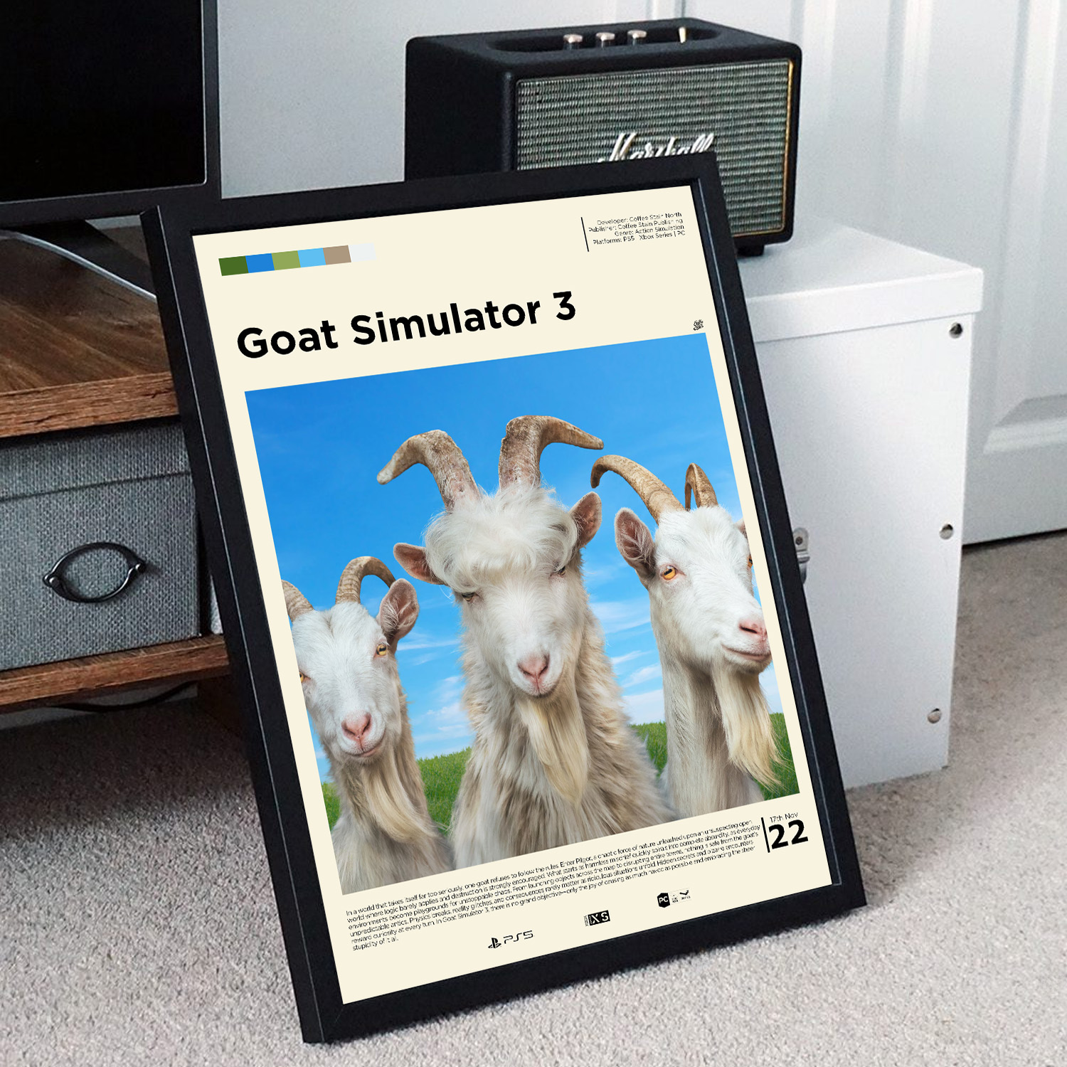 Minimalist, gallery-style Goat Simulator 3 poster in a black frame leaning against a unit
