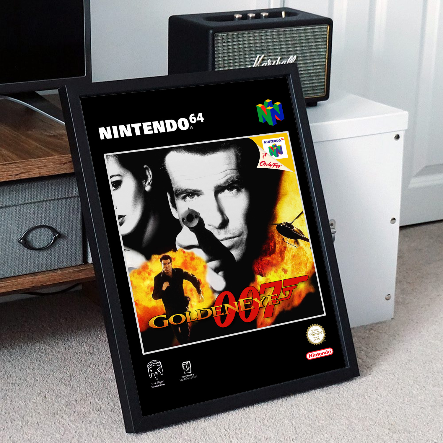 Minimalist, gallery-style Goldeneye 007 poster in a black frame leaning against a unit